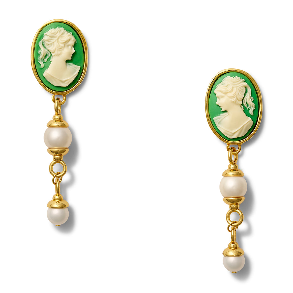 Pair of earrings with green cameo and pearl drops on a white background